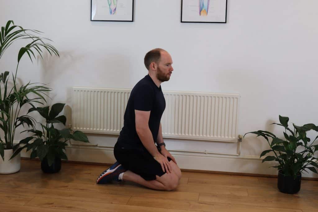 Picture of james mcccormack doing a Anterior Tibialis Stretch