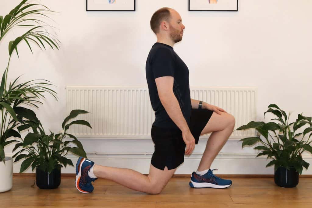Phot of man stretching hip flexor